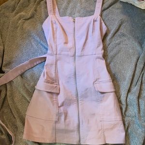 Divided, light purple cargo dress with belt.